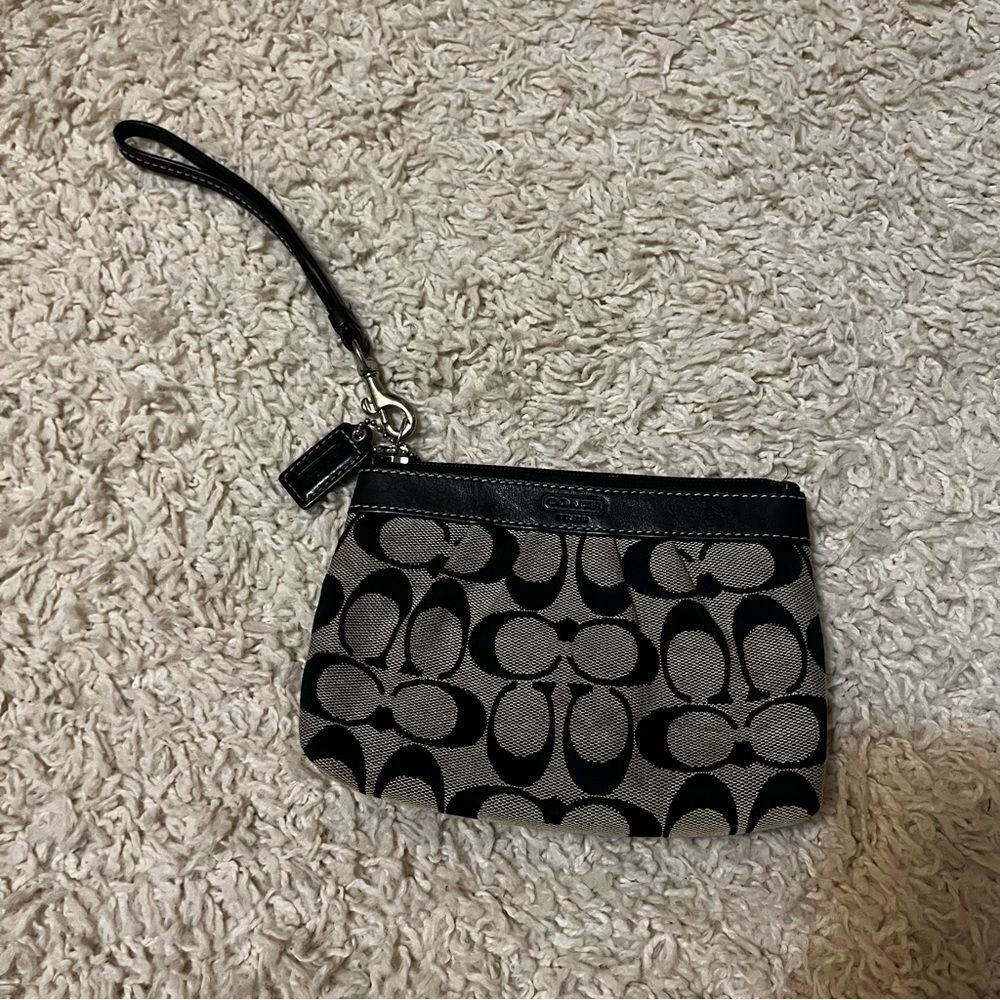coach signature logo wristlet